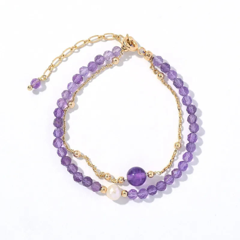 Women's amethyst Chinese style crystal bracelet with diamond-shaped beads and electroplated metal.