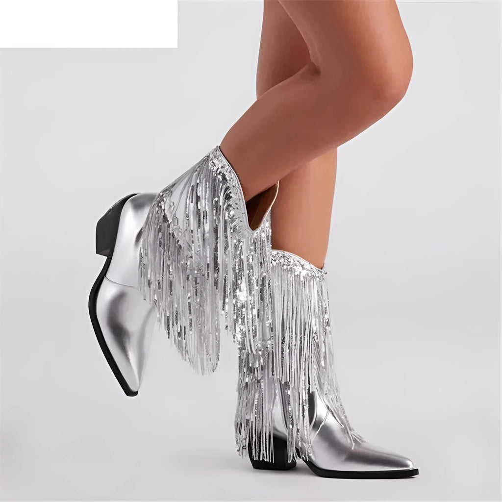 Women's black chunky heel tassel ankle boots with a super-high stiletto heel on a white background.