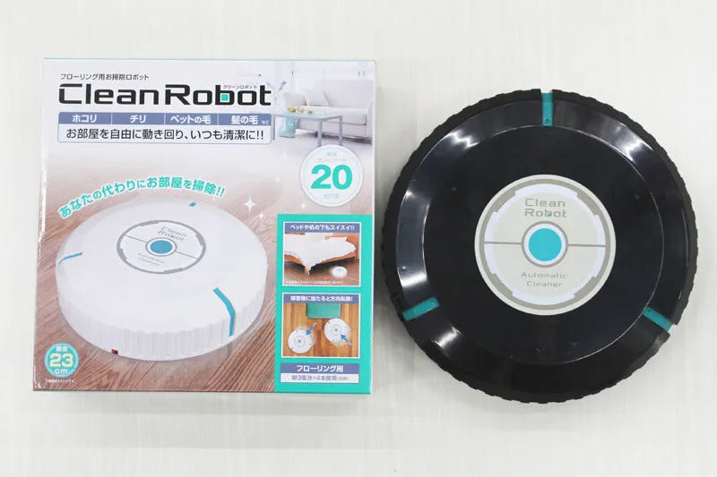 AC automatic sweeping robot on wooden floor with black ABS plastic body