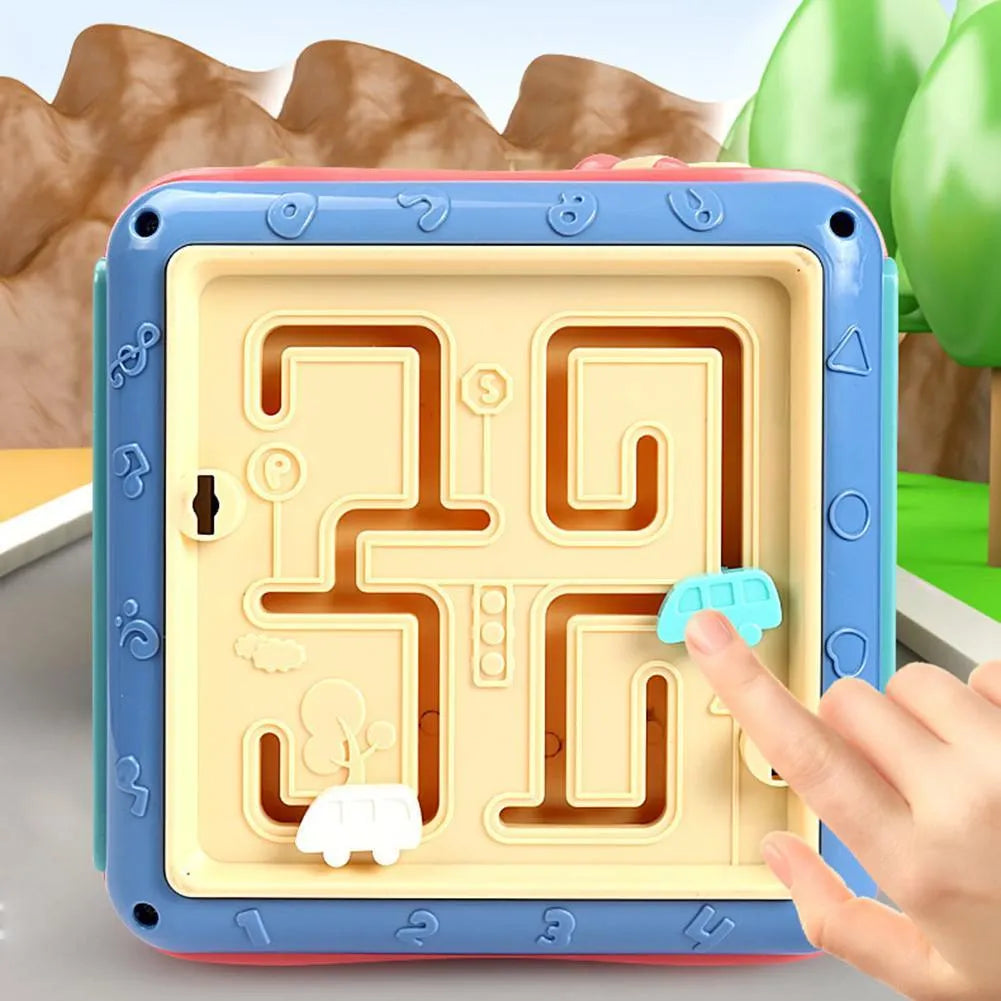 Colourful baby educational toy cube with six different activity sides including bead maze and gears.