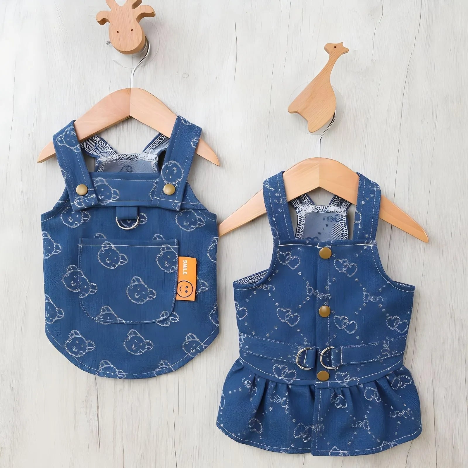 Denim princess dress for small dog on hanger showing bracket detailing and lightweight construction
