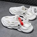Grey closed-toe EVA coconut slippers on a flat sole