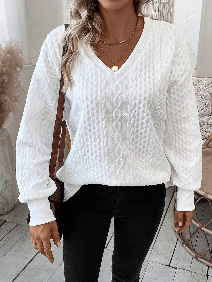 Milky white loose fit long sleeve T-shirt with 3D pattern detail on mannequin