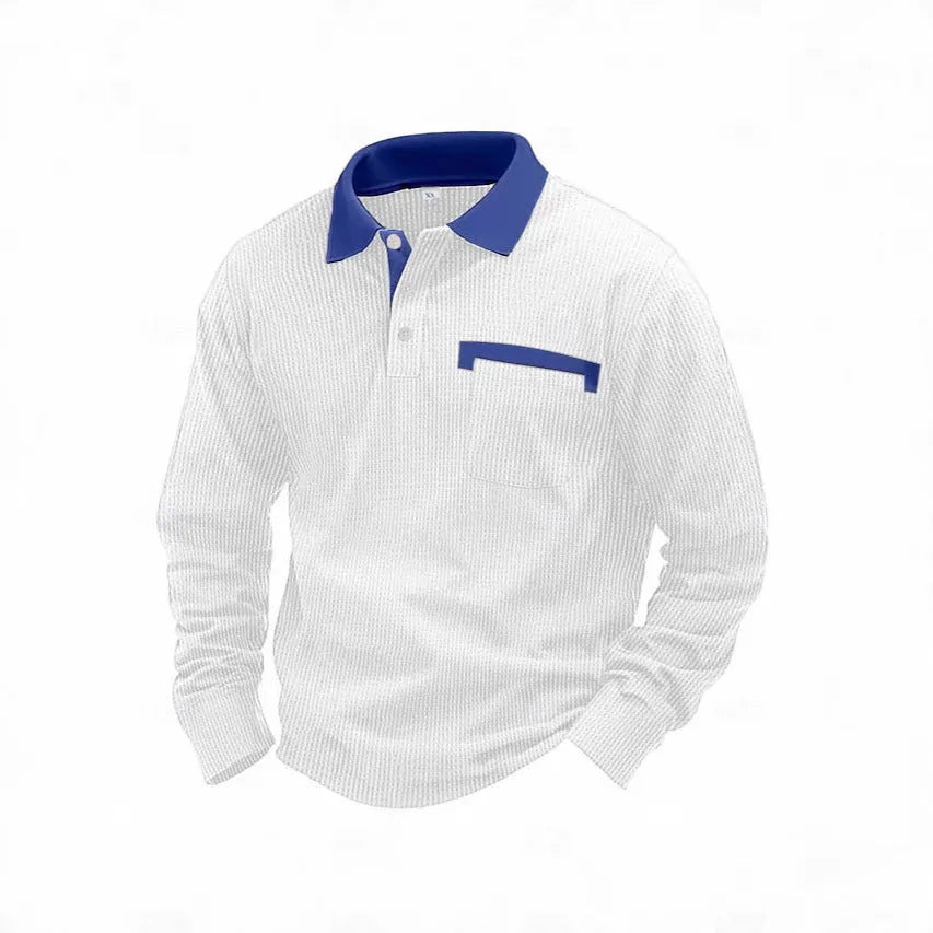 Man modelling a loose-fit long sleeve polo shirt with a waffle-texture fabric in a solid colour.