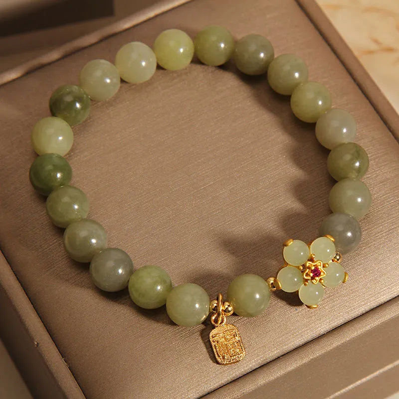A women's casual alloy bracelet with a grey jade colour finish and a clasp.