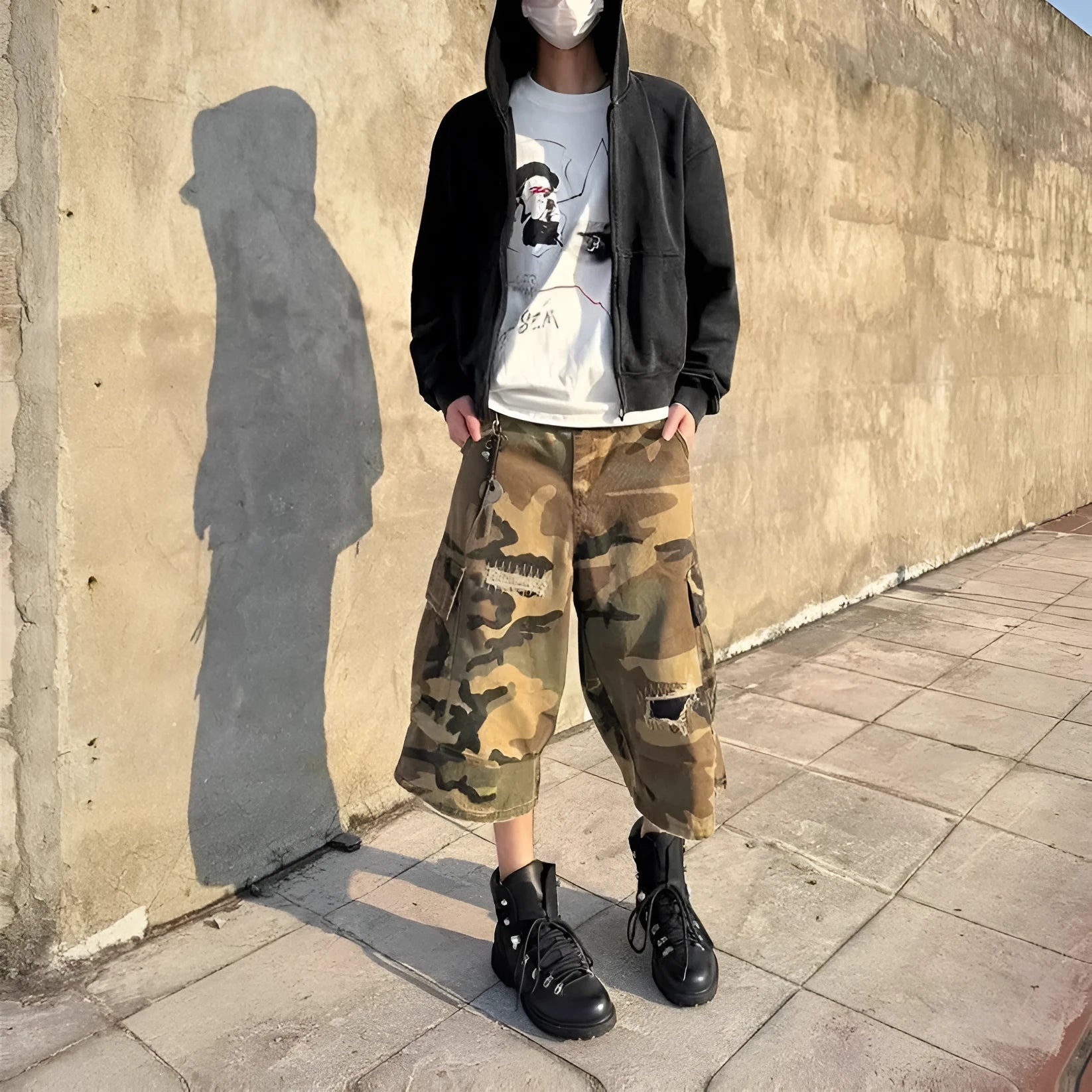 Men's loose camouflage jeans with retro patches and ripped detailing in cropped straight cut