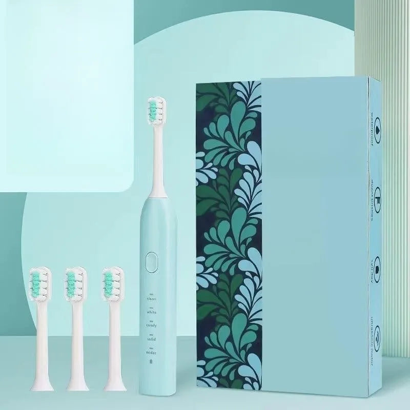 Small yellow duck electric toothbrush with soft bristles and USB charging in green pink and yellow colours