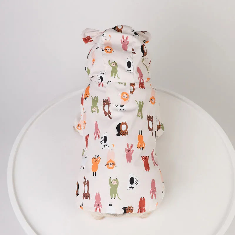 Beige dog raincoat with cartoon animal design in waterproof PU material