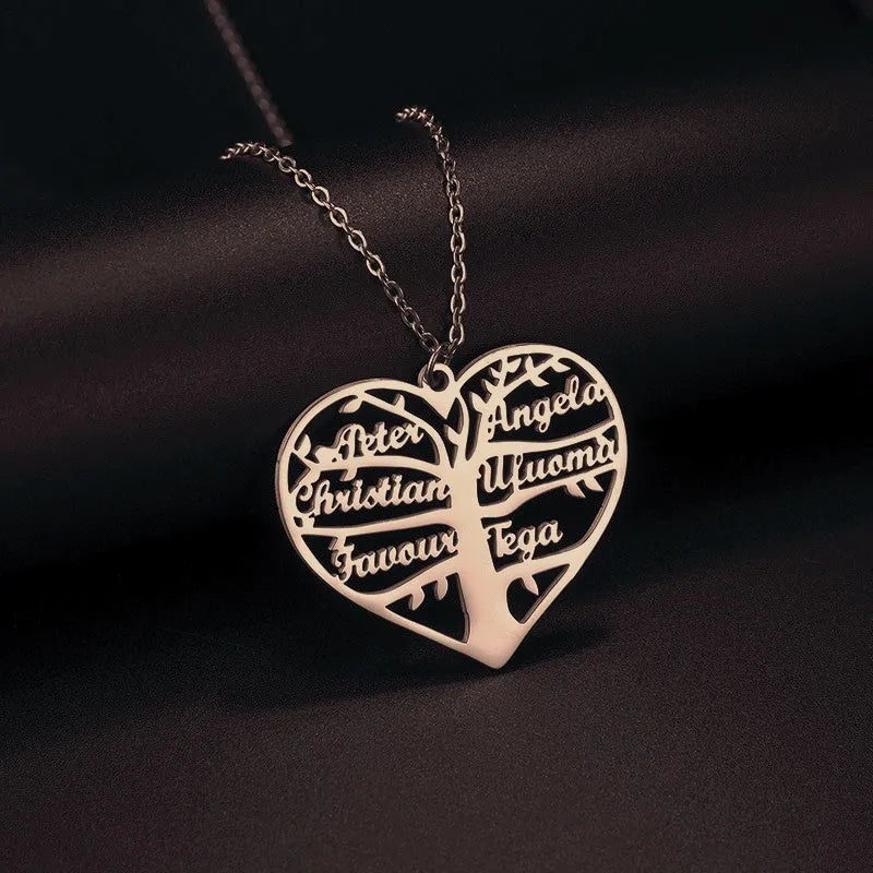Personalised stainless steel necklace with engraved names on a heart and tree pendant in silver, gold, or rose gold.