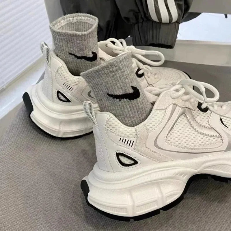 Beige mesh platform sports shoes with a wedge heel and front lace-up design