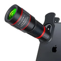 20x magnification smartphone telescope lens with universal mounting clip on a mobile phone.