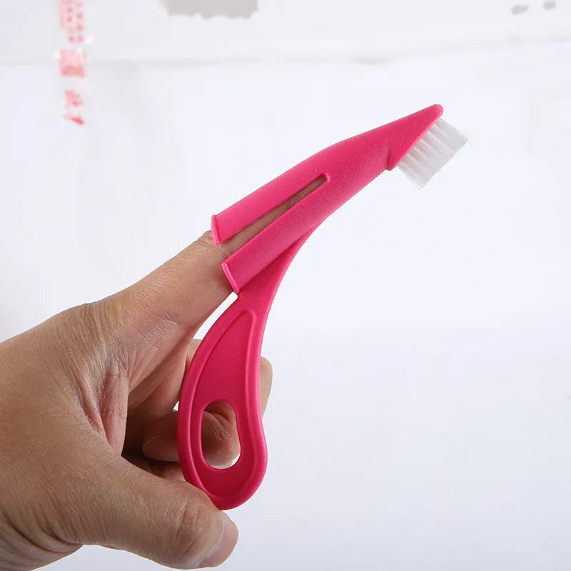 Red and white pet finger toothbrushes with silicone bristles for dog and cat dental cleaning.