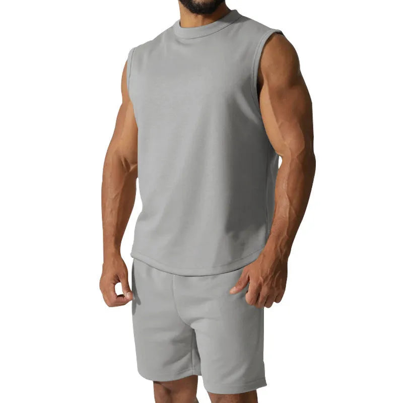 Men's sleeveless sports suit two-piece set in cotton blend fabric showing top and matching shorts