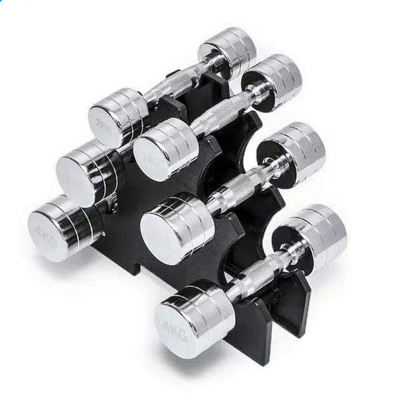 Silver electroplated pure steel dumbbell on a grey background, showing ergonomic handle.