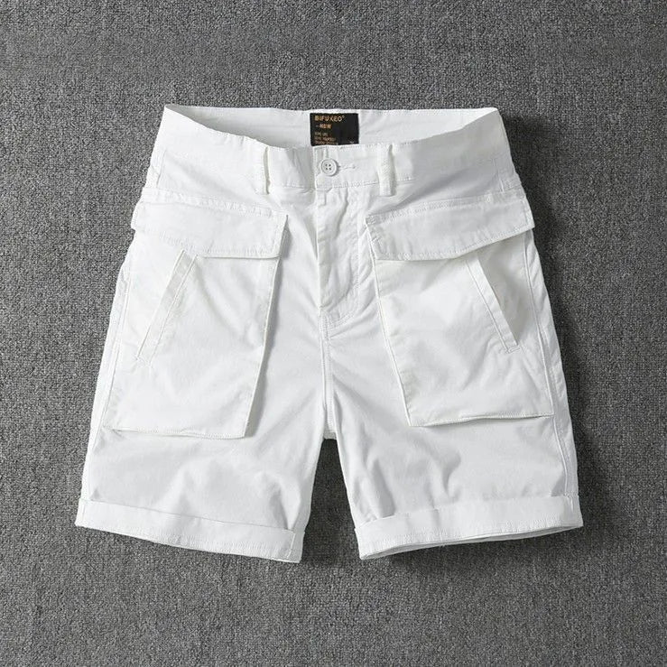 Men's stretch cotton cargo shorts in army green showing multiple pockets and straight-leg fit.