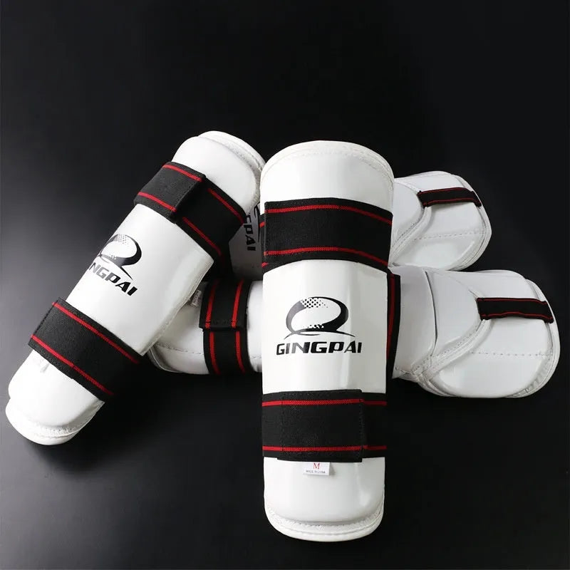 Taekwondo protective gear set showing arm guard, elbow guard and leg protector in PU EVA material