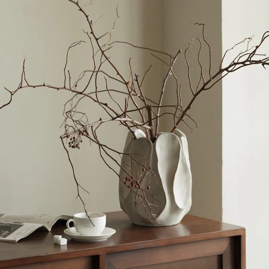 Irregular ceramic vase handcrafted from magnesium clay for flower arrangements
