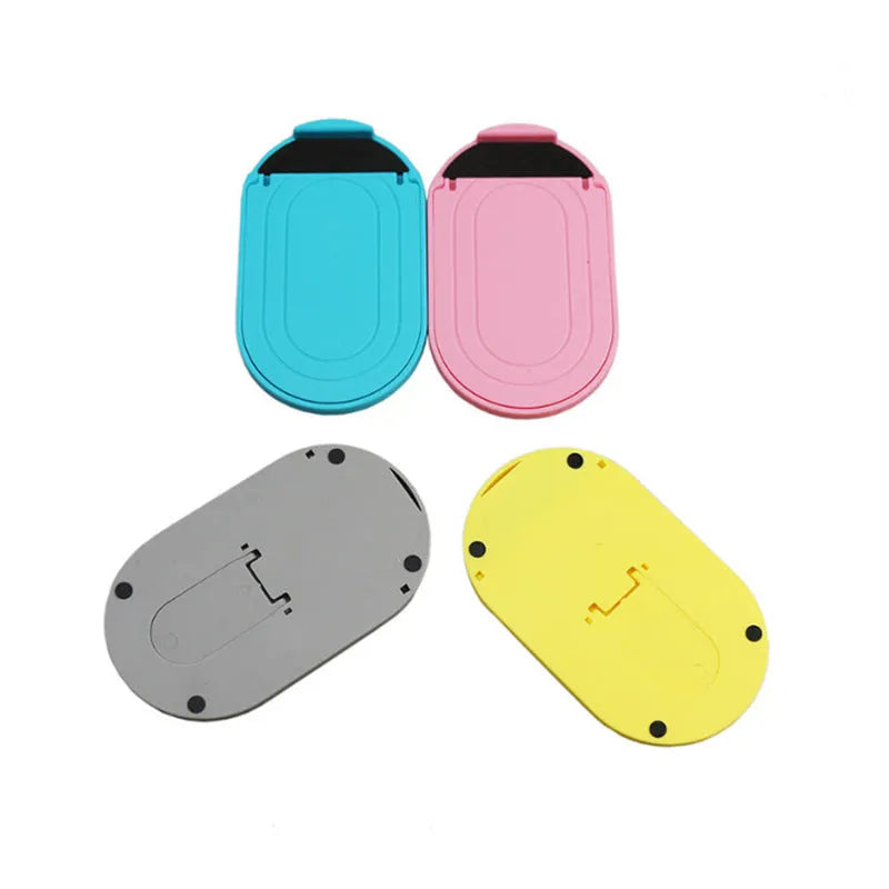 Adjustable plastic mobile phone stand in six colour options showing lazy bracket design