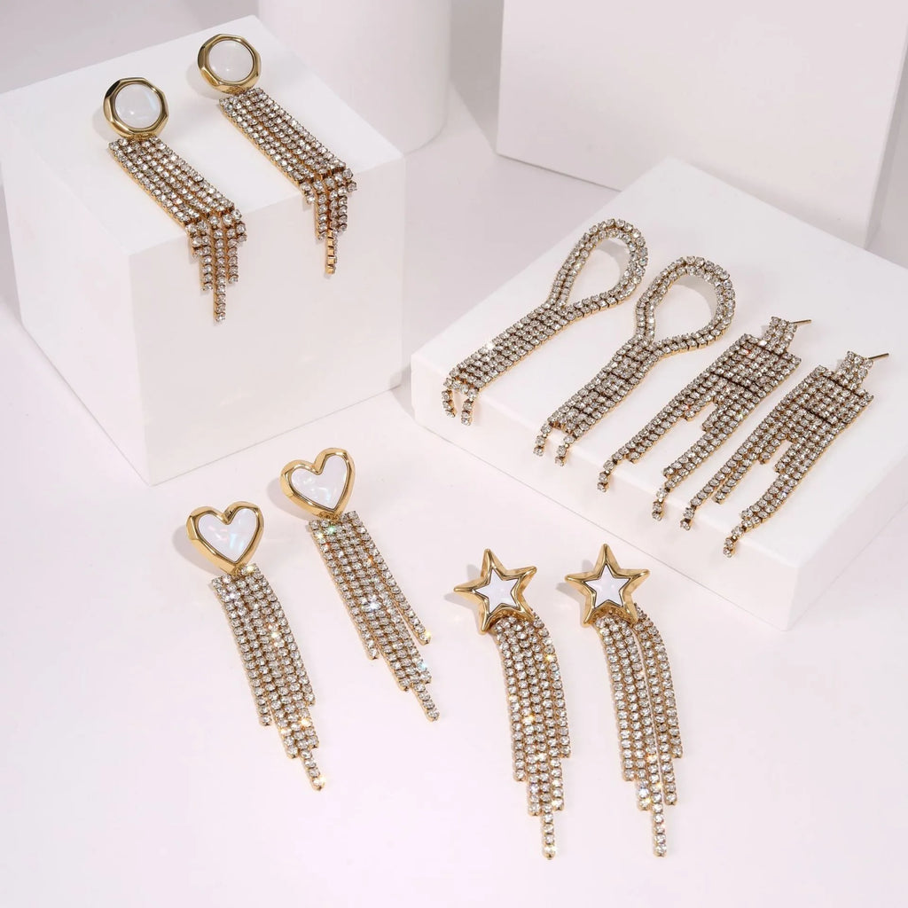 Gold plated geometric earrings for women featuring heart and star shapes with a diamond tassel.