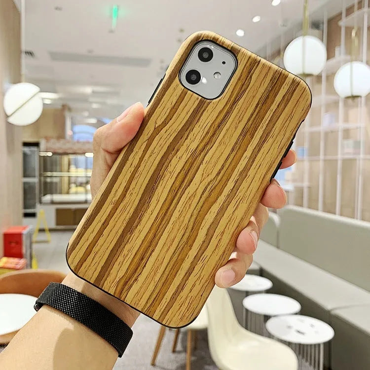 Natural wood iPhone case in back cover style showing timber grain patterns