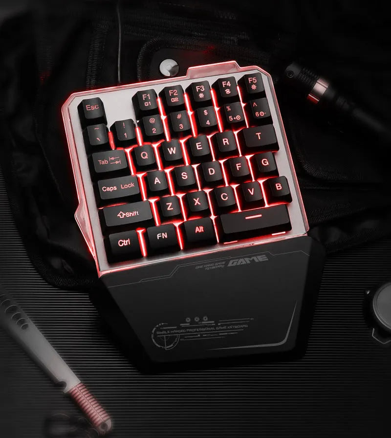 Black one-handed mechanical gaming keyboard with RGB backlit keys and USB cable