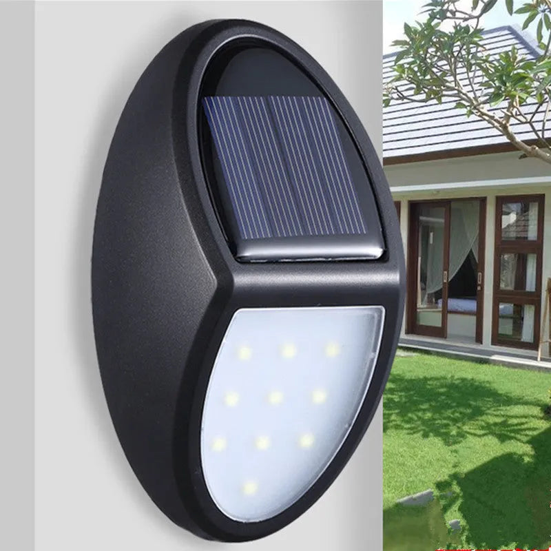 Black LED solar wall light measuring 75x120mm with auto sensor and 8 hour battery life