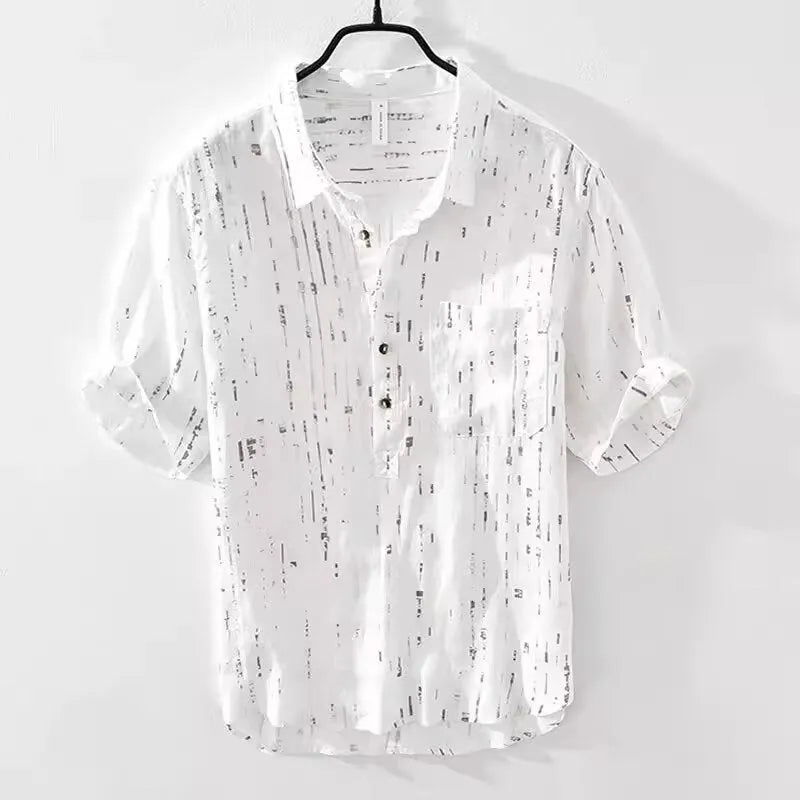 Men's loose fit short sleeve polo shirt in black, showing lapel collar and cardigan style