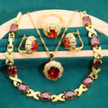 Gold plated jewellery set with multi-colour cubic zirconia stones, featuring a necklace, earrings, a ring, and a bracelet.