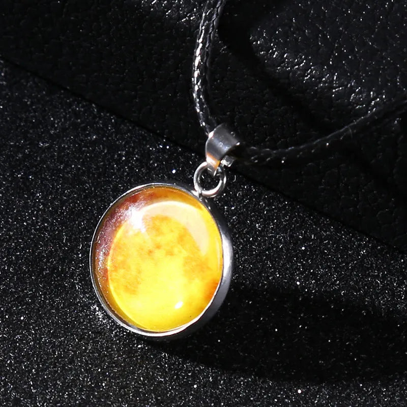 Alloy necklace with luminous glass pendant showing Christmas moon night sky and constellation design.