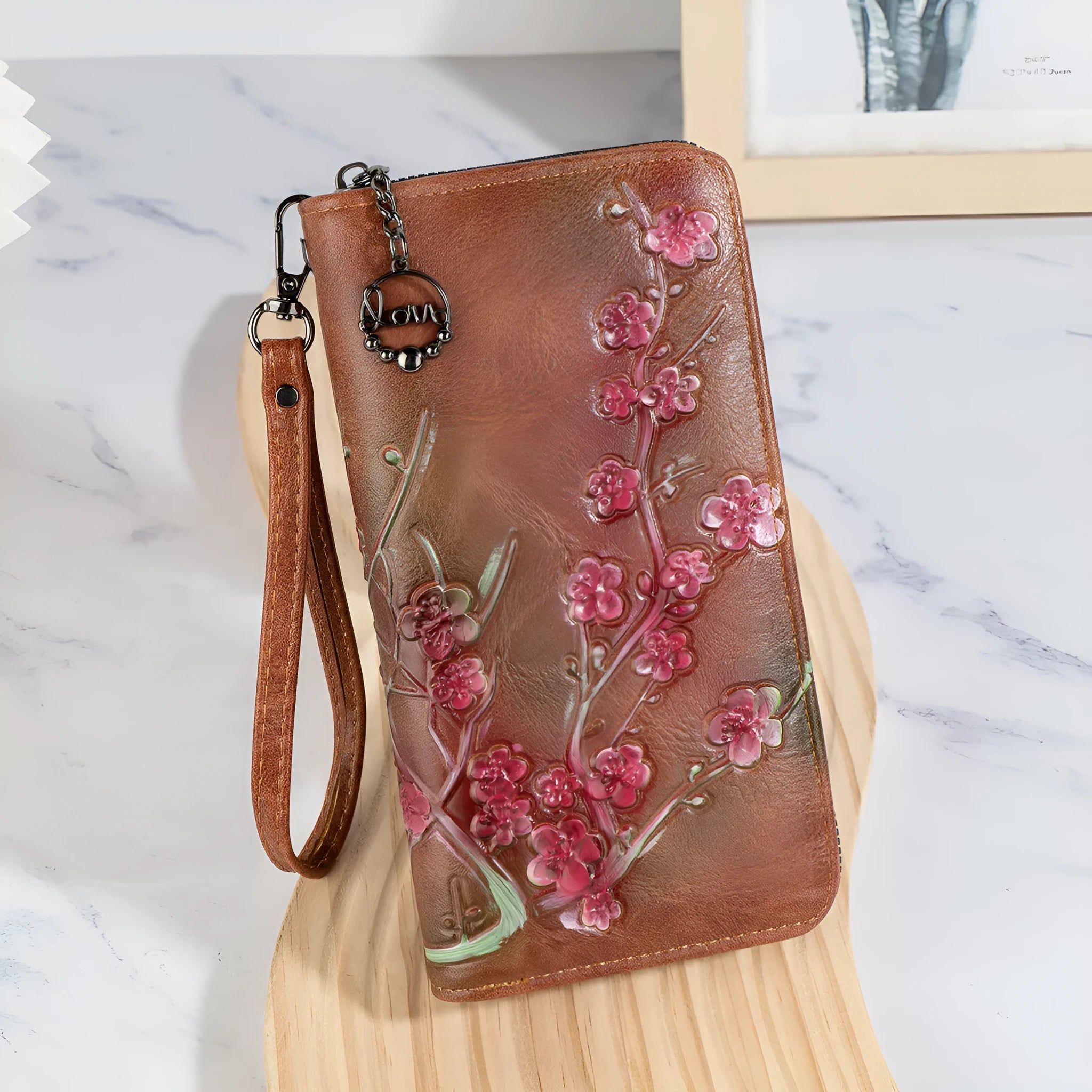 Embossed floral pattern Chinese style handbag with zipper closure in black colour