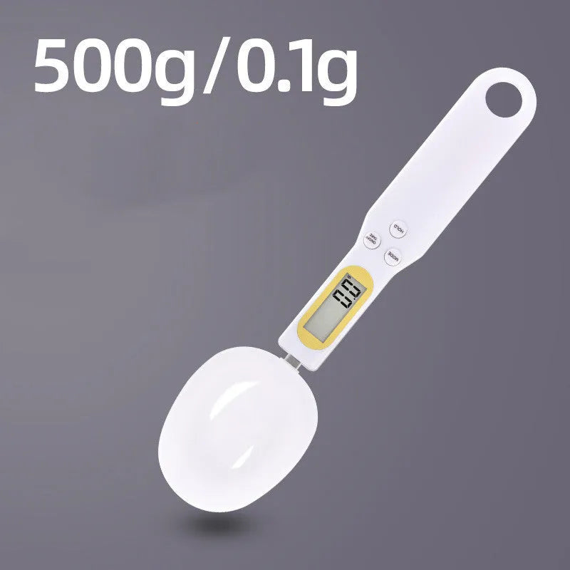 Black electronic measuring spoon scale showing digital display, 23.2cm long.