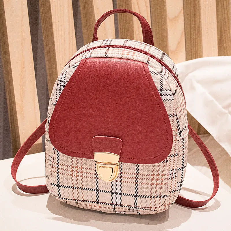 A one shoulder diagonal crossbody phone bag made from PU leather in one of five colour options.