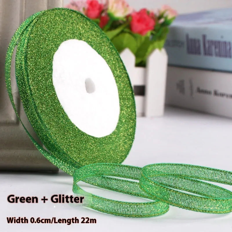 Roll of narrow 0.6cm wide polyester satin ribbon in a choice of colours, showing 22 metre length.