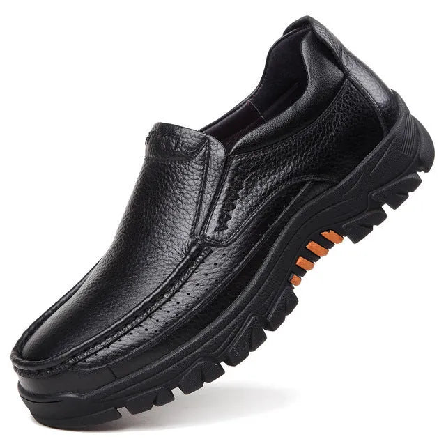 Men's black and brown business casual slip-on shoes made from soft cowhide leather with rubber soles.