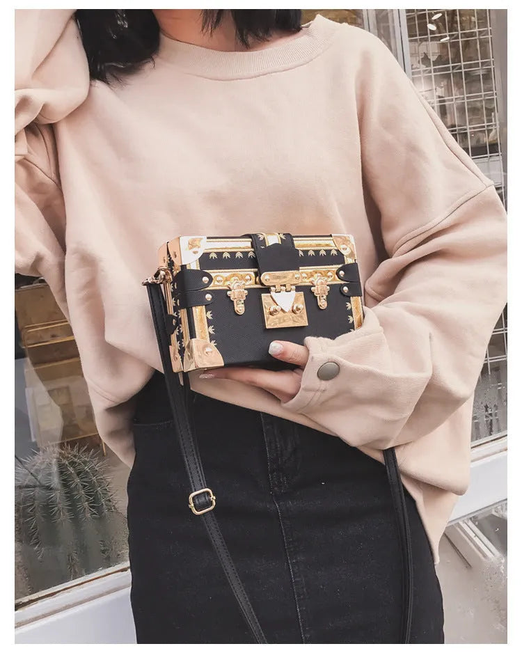 Women's hard PU leather shoulder bag with crossbody strap and flap design