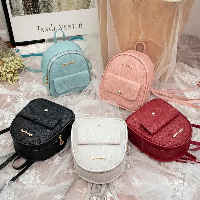 Women's black PU shoulder bag backpack compact letter purse with zipper closure