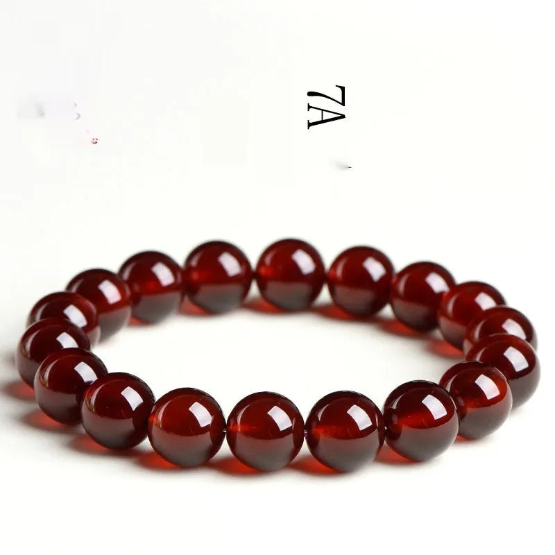 Natural orange red garnet crystal ball bracelet with Ruyi symbols in retro unisex design
