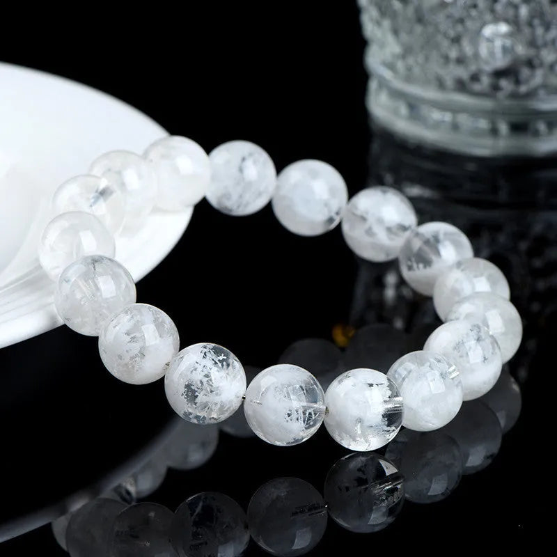 Natural blizzard snowflake round crystal bead women's bracelet with Ruyi and Xiangyun design.