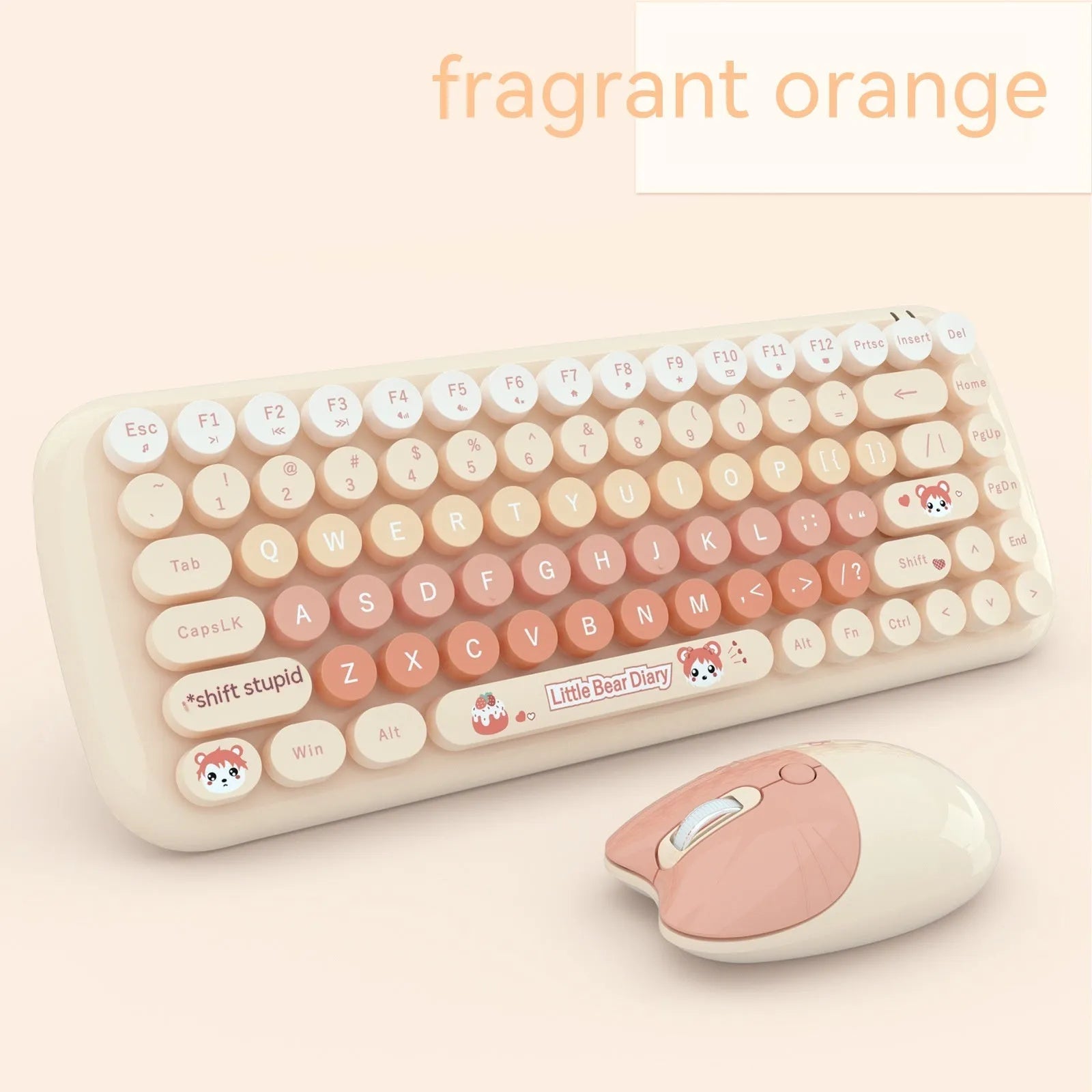 Pink wireless keyboard and mouse set with compact design on a desk