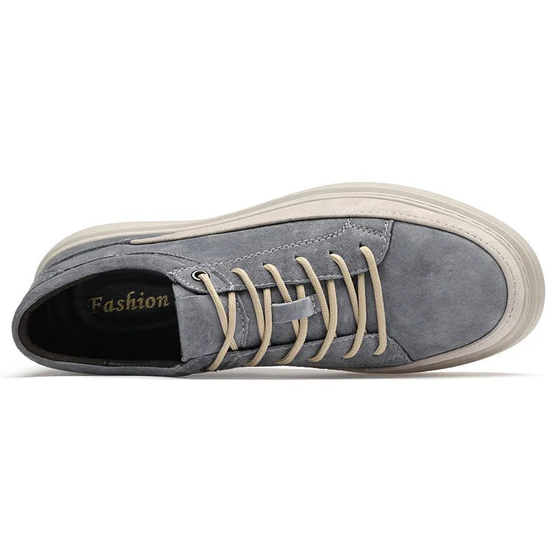 Men's grey and sand coloured low-top casual skate shoes with round toe and lace-up front.
