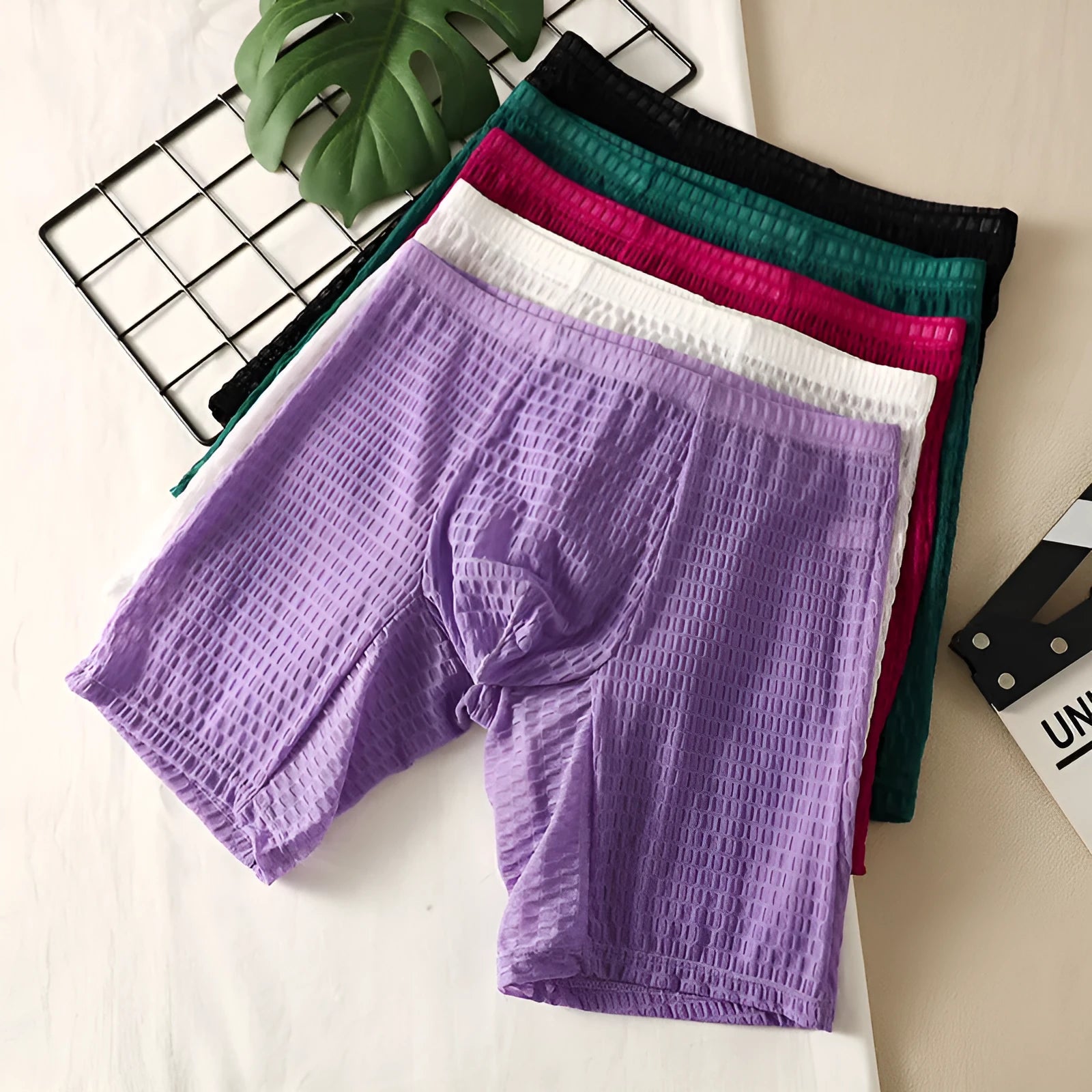 Men's solid colour lace boxer shorts with a hip-lifting design in light purple