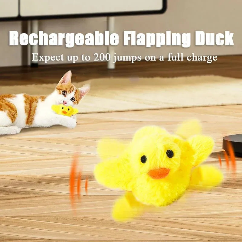 Yellow chick-shaped rechargeable cat plush toy with a removable cover and USB cable.