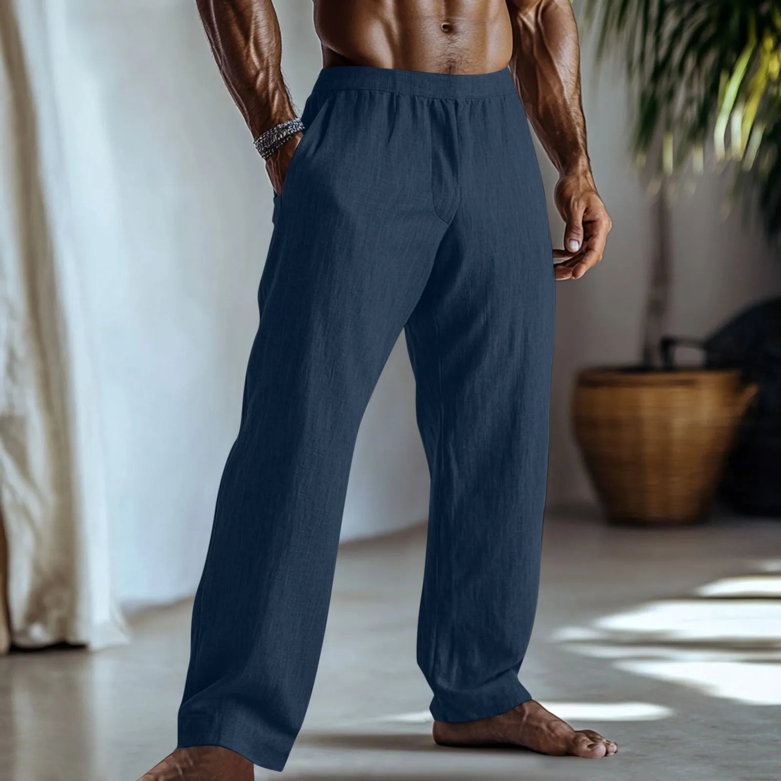 Straight-leg casual trousers in cotton and linen fabric, shown in a light green colour with visible side pockets.
