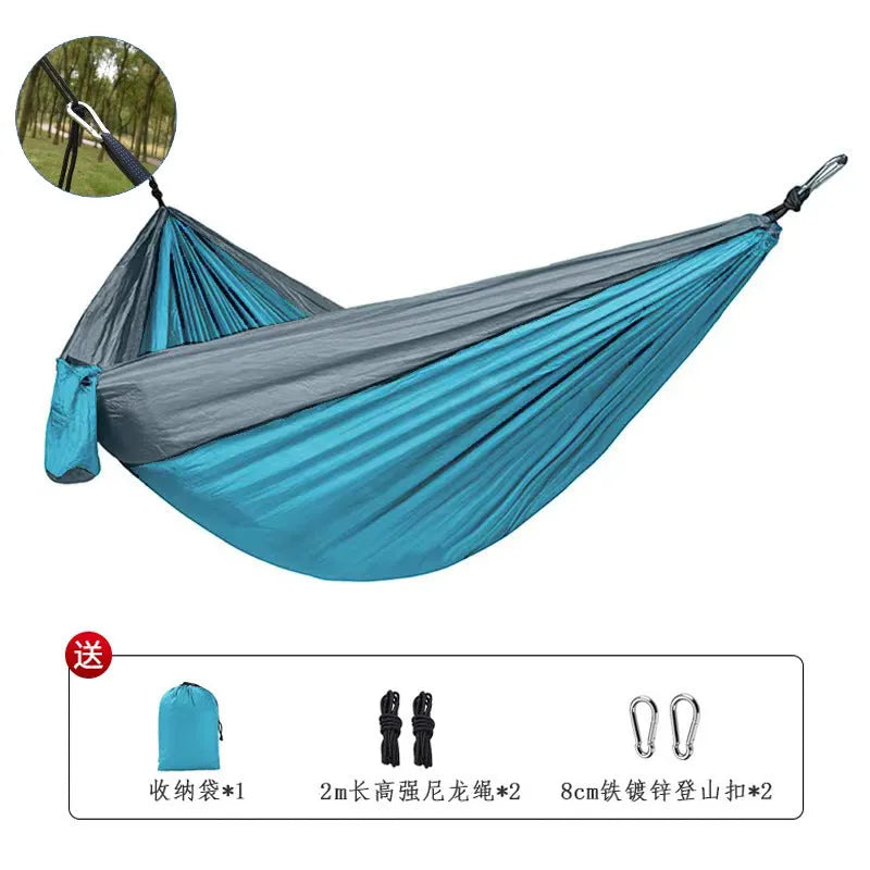 Outdoor nylon hammock in blue colour with reinforced stitching for camping and garden use