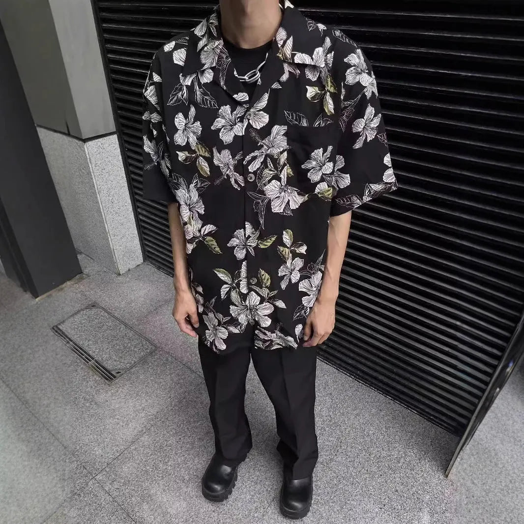 Black vintage Cuban collar ice silk shirt with flower print and short sleeves.