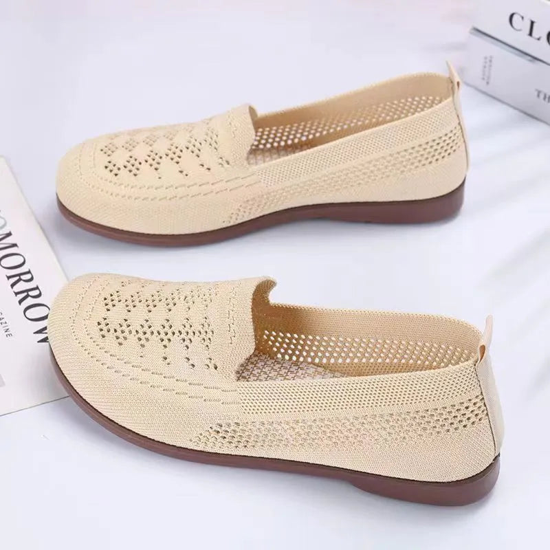 Beige women's low-top mesh casual shoes with a round toe and lightweight PVC sole.
