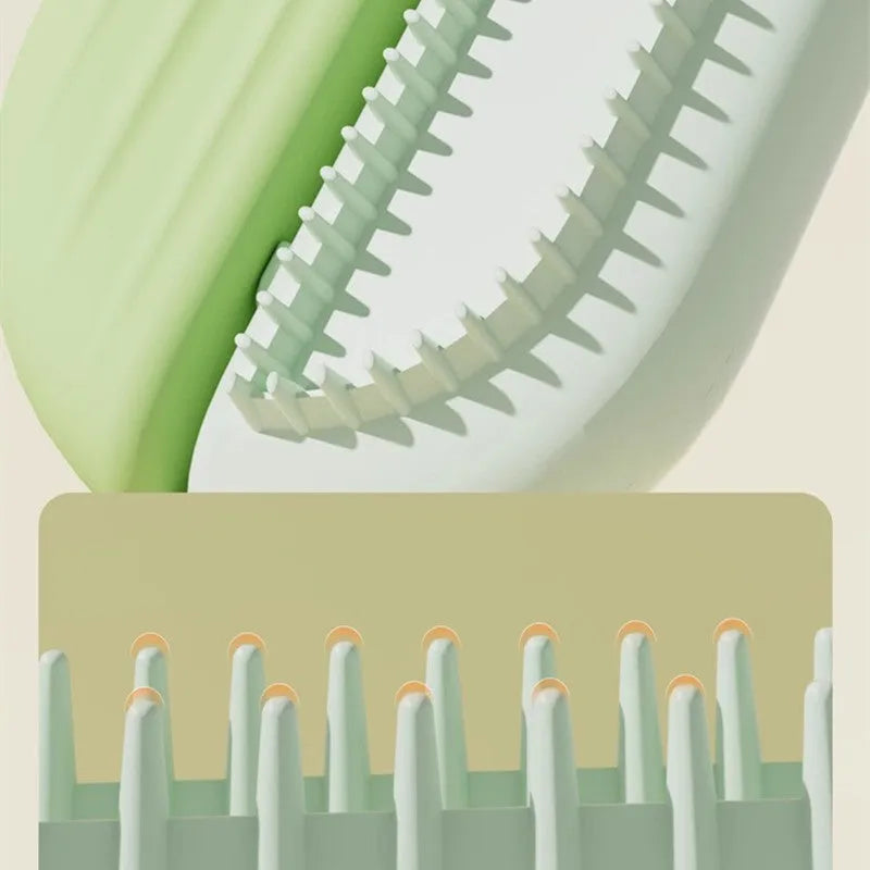 Blue plastic pet grooming comb with water tank for cats and dogs on a white background