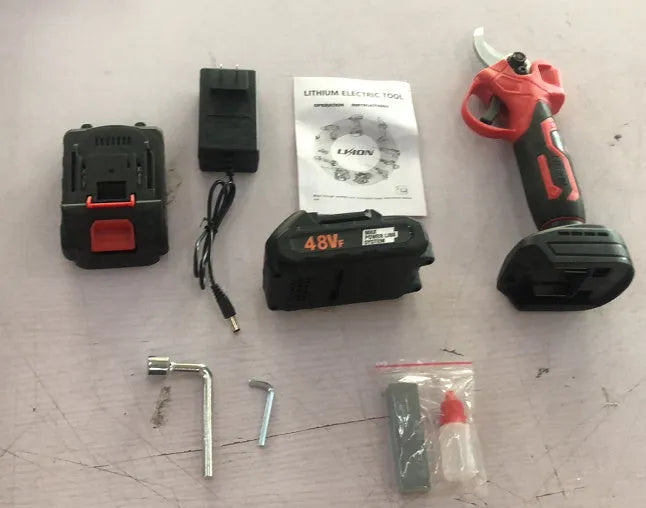 Cordless electric pruning knife with lithium battery and plastic storage case for garden branch cutting.