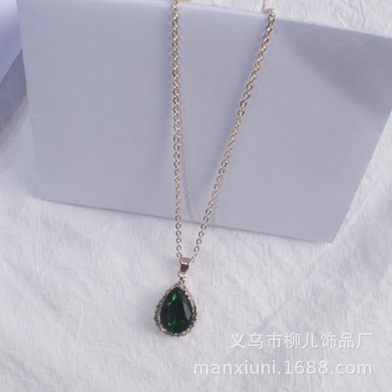 Rose gold pink drop shape women's necklace with geometric rhinestone detailing and alloy construction
