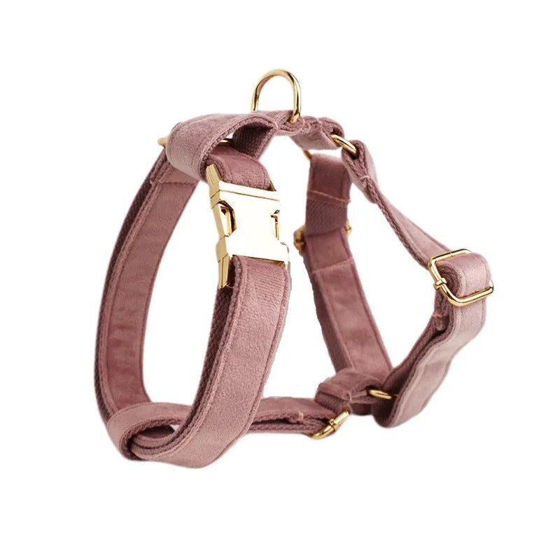 Light purple and pink velvet dog collar with matching leash and bow accessory set on a white background.
